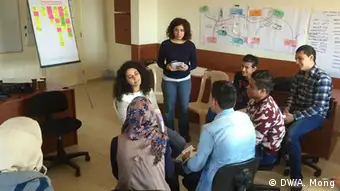 Citizen journalist trainees practise a mock empathy interview