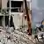 Разрушенное от удара ВСУ здание в Макеевке, в котором располагались российский военные 