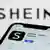 Shein on App Store displayed on a phone screen and Shein website displayed on a screen in the background are seen in this illustration photo taken in Krakow, Poland on January 19, 2023. 