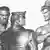 Tom of Finland graphite drawing of three muscular men.