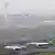 Thai Arways and Eva Airways aircraft on Tokyo runway after minor collision