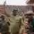 Niger, Niamey | Le General Mohamed Toumba salue la foule lors d'un rassemblement pro-junte dans le srade de Niamey, le 6 août