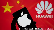 08.09.2023****Apple logo displayed on a smart phone with China flag with Huawei seen in the background, in this photo illustration. On 8 September 2023. In Brussels, Belgium. (Photo illustration by Jonathan Raa/NurPhoto)