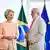 European Commission President Ursula von der Leyen and Brazilian President Lula with flags behind them 