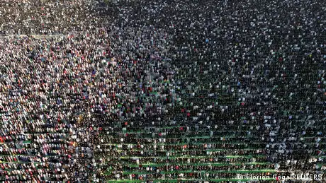 A drone view of Albanian Muslims attending Eid al-Fitr prayers to mark the end of the holy fasting month of Ramadan.