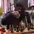 Nigerian chess champion Tunde Onakoya in action in New York's Times Square