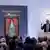 Auctionator Michael Kovacek, co-managing Director of Kinsky Auction House, oversees the bidding during the auction for Austrian artist Gustav Klimt's portrait "Bildnis Fraeulein Lieser," last seen in public in 1925, in Vienna, Austria